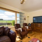 Image of Self catering cottage lounge and view
